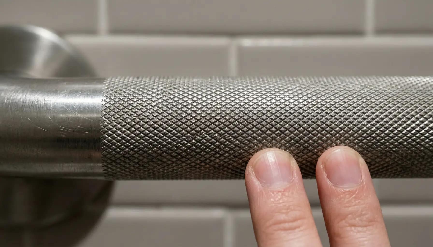 close-up of textured grab bar surface showing non-slip grip pattern